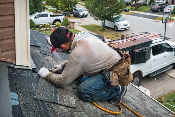Professional Roofing technician working in Adams, WI